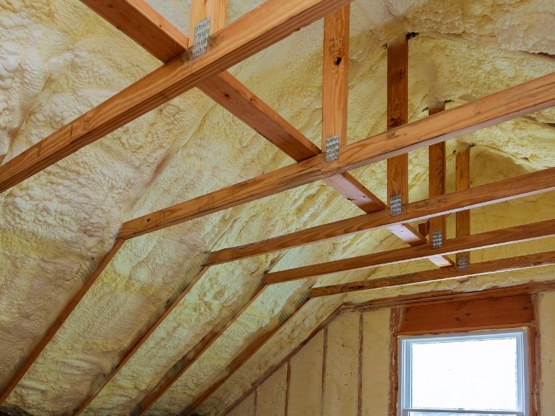 Insulation of attic with foam polyurea insulation cold barrier and insulation material